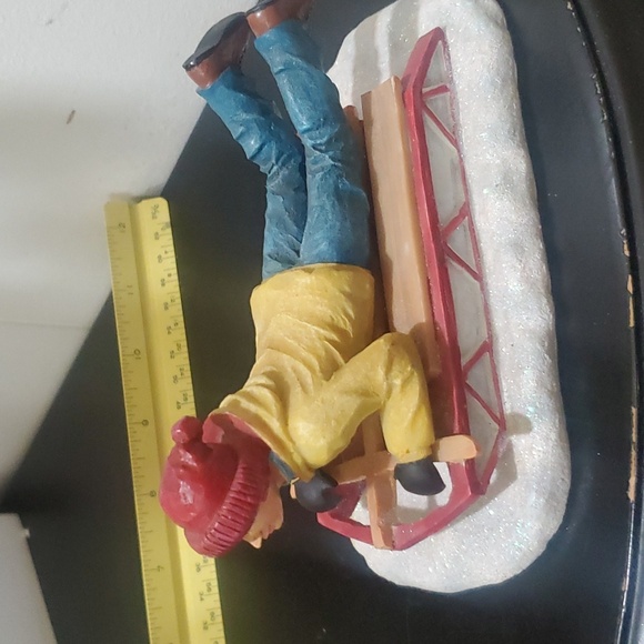 Boy in Blue & Yellow Lying Down on a Sled Holiday Lead Figure - Picture 2 of 6